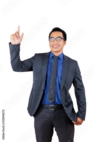 Happy businessman touching on transparent screen