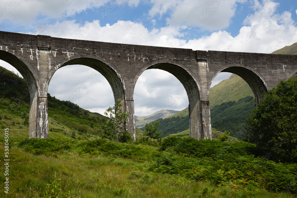 The Glenfinnan Viaduct, is a railway on the West Highland Line located at the top of Loch Shield in the West Scottish Highlands