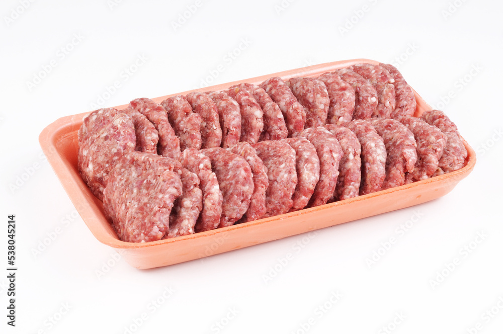 Raw meatball in plate package isolated
