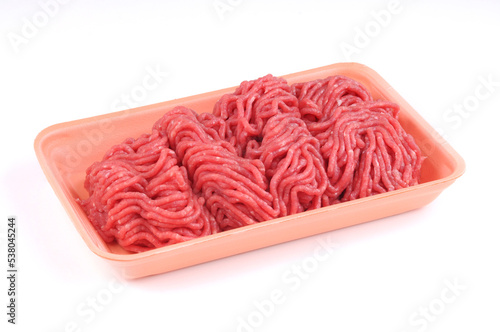 Raw mince in plate package isolated
