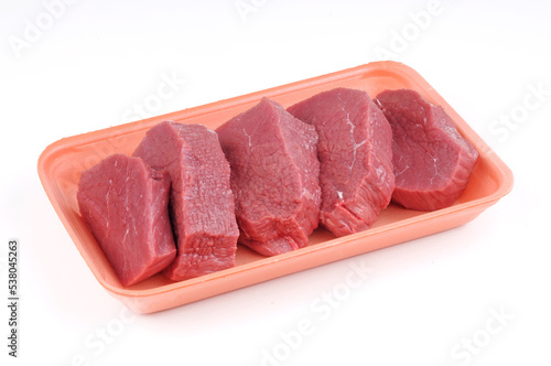 Raw Beef slice in plate package isolated
