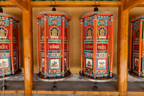 Prayer wheels at Labrang Temple, Xiahe, Gannan, Gansu, China photo