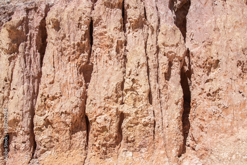 Skazka Canyon photo of bizarre smooth and smooth shapes of red clay and rocks © ROMAN_P