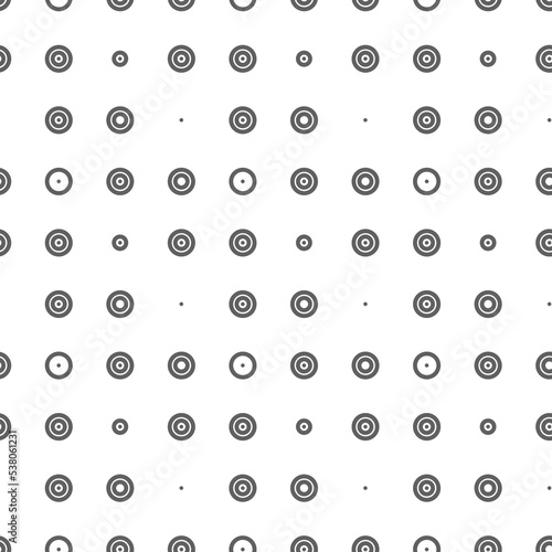 Vector illustration. Geometric seamless pattern. Solid dots and linear circles in rows. Spotted grey, black and white background. Simple monochrome abstract pattern.