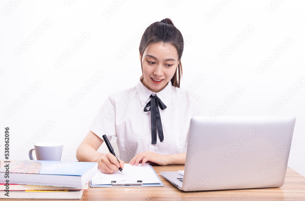 Asian female students taking an online class against a white background Asian female students taking an online class against a white background