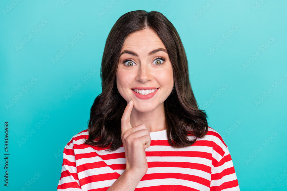 Close up photo of minded positive girl arm touch face good mood wear striped stylish outfit isolated on cyan color background