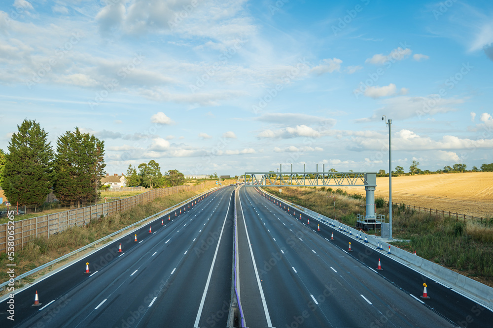 Fototapeta premium heavy traffic in blurry motion on UK motorway in England
