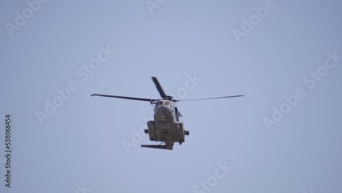 Wallpaper Mural A Heavy Military Transport Helicopter Flying with Blue Sky Background. Torontodigital.ca