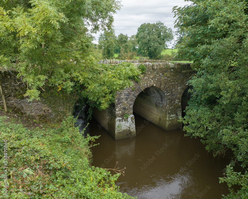 old stone bridge over the river in ireland