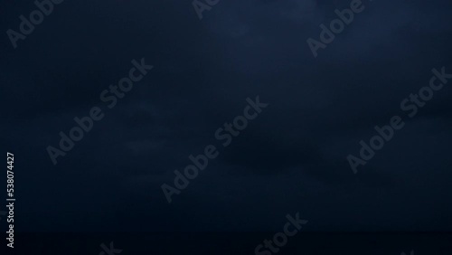 Nightshot 4K 120 fps super slow motion: flashes of lightning in thunderstorm scenery around Curacao, the Caribbean photo