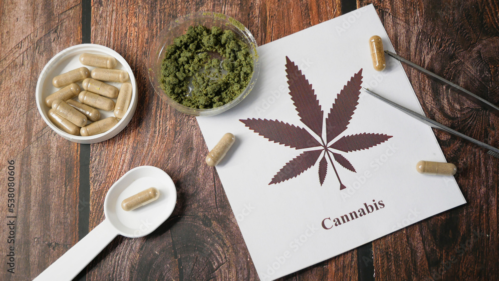 CBD Hemp pills and extract. Cannabis drugs, marijuana buds and dry grass. Cannabis pills containers with CBD. Alternative Medicine CBD Hemp pills and extract. Cannabis drugs, marijuana buds and dry grass. Cannabis pills containers with CBD. Alternative Medicine