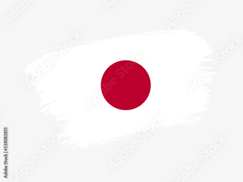Japan flag made in textured brush stroke. Patriotic country flag on white background