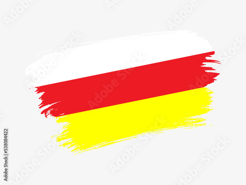 North Ossetia flag made in textured brush stroke. Patriotic country flag on white background