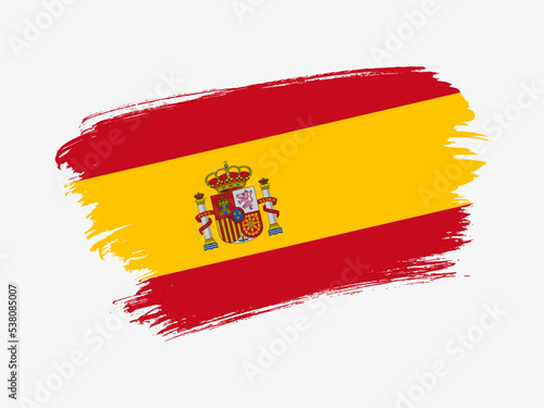 Spain flag made in textured brush stroke. Patriotic country flag on white background