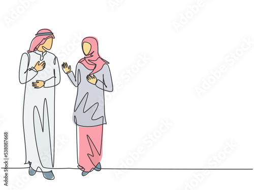 Single continuous line drawing of young muslim business couple discussing product sales strategy together. Arab middle east cloth shmagh, thawb, robe, hijab. One line draw design vector illustration