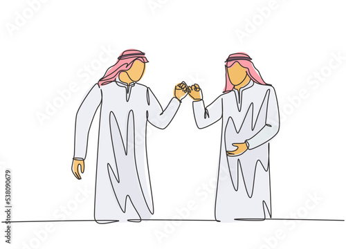 One single line drawing of young happy muslim workers fist bump their hands together. Saudi Arabian businessmen with shmag, kandora, headscarf, thobe. Continuous line draw design vector illustration photo