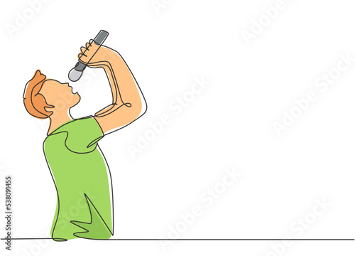 Single continuous line drawing of young happy male rocker singer holding microphone and singing on music festival stage. Musician artist performance concept one line draw design vector illustration