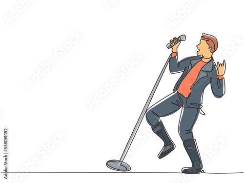 One single line drawing of young happy male rocker singer holding microphone and singing on concert stage. Musician artist performance concept continuous line draw design graphic vector illustration