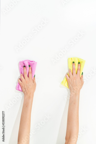 woman hand holding cleaning cloth on white background