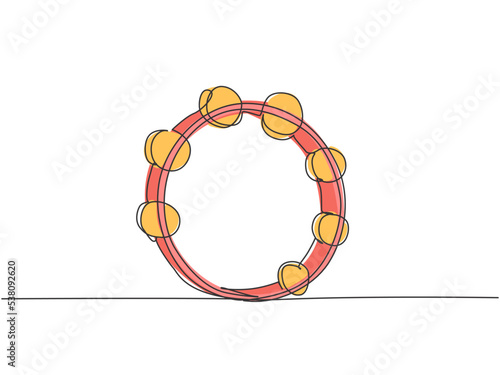One continuous line drawing of round circle tambourine. Dynamic percussion music instruments concept single line draw graphic design vector illustration