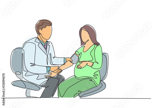 One single line drawing of male obstetrics and gynecology doctor checking the patient blood pressure and fetal condition. Pregnancy health care concept continuous line draw design vector illustration
