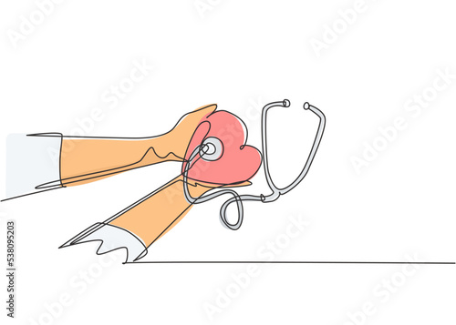One single line drawing of young doctor holding stethoscope and heart shape decoration as symbol healthy heart beat. Medical health care concept continuous line draw design vector graphic illustration