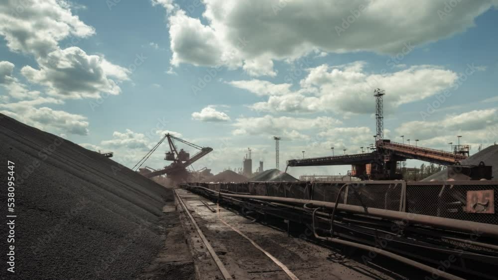 Stary Oskol, Russia - May 21, 2021: Clouds and metallurgical production Stary Oskol, Russia - May 21, 2021: Clouds and metallurgical production