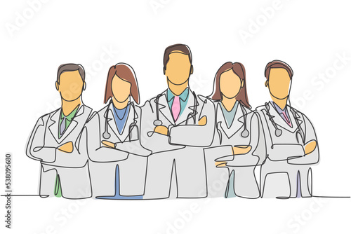 Single continuous single line drawing group of young promising doctor posing standing and cross hands on chest together at hospital. Medical teamwork concept one line draw design vector illustration