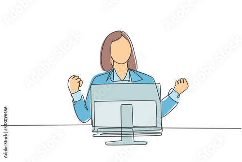 Single continuous line drawing of young happy female worker celebrating her promotion on work desk in front of computer monitor. Business celebration concept one line draw design vector illustration