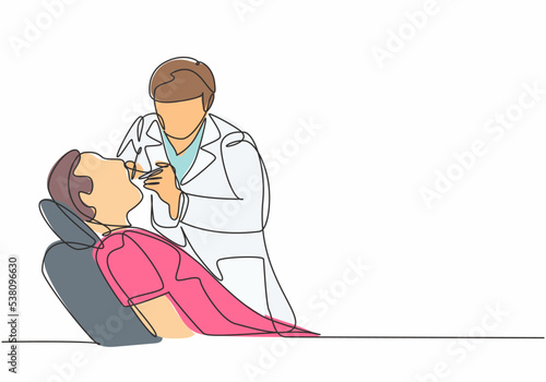 Single continuous line drawing of young male dentist examining patient teeth condition and doing tooth filling. Medical health care service workers concept one line draw design vector illustration
