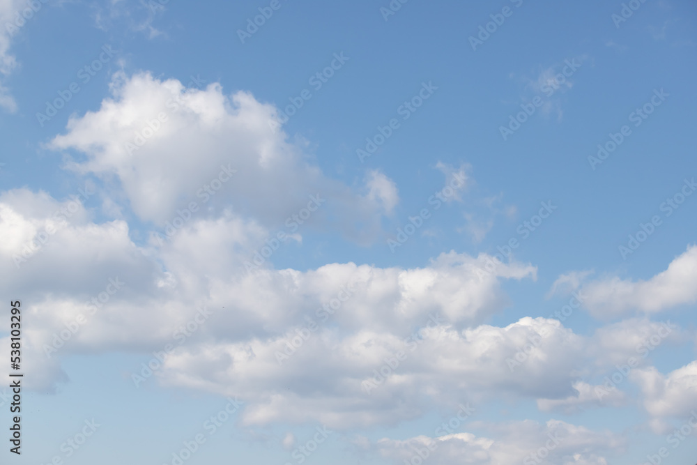 Blue sky background with white clouds. Blue sky background with white clouds.