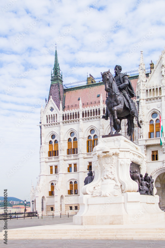 BUDAPEST, HUNGARY - JULY 20, 2022: Equestrian statue of Gyula Andrássy at Lajos Kossuth Square in front of the Hungarian Parliament in Budapest, Hungary