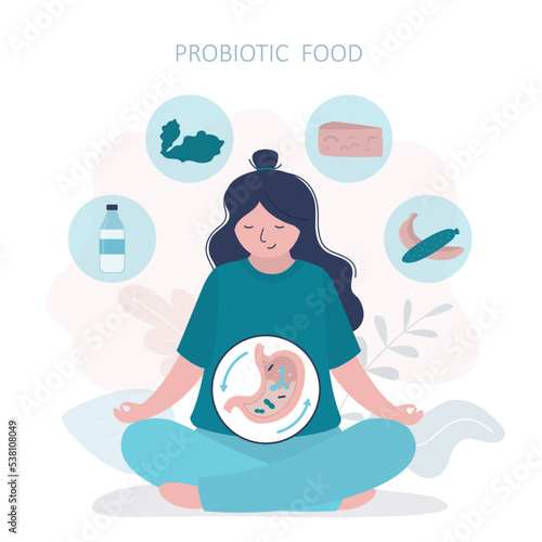 Woman eats foods containing large amount of probiotics. Dairy products, fruits help stomach work