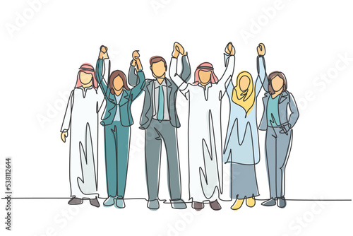 One continuous line drawing of young male and female manager raising hands up to celebrate target achievement. Islamic clothing shemag, kandura, hijab. Single line draw design vector illustration