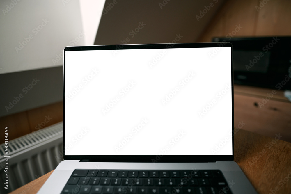 Top view of an open modern laptop blank screen or notebook isolated on table. free space for your copy, view from top. Top view of an open modern laptop blank screen or notebook isolated on table. free space for your copy, view from top.