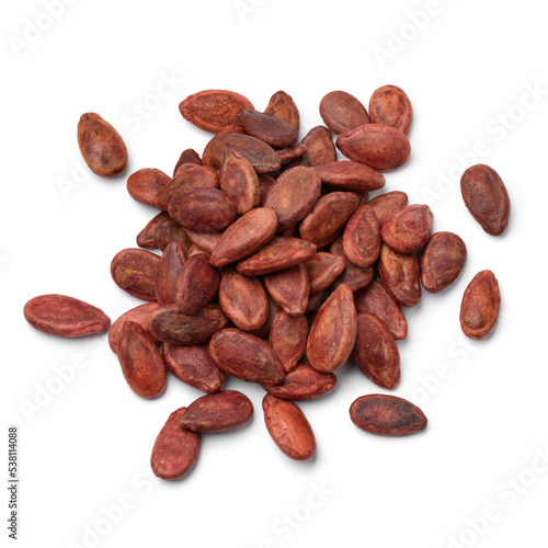 Heap of dried watermelon seeds close up isolated on white background