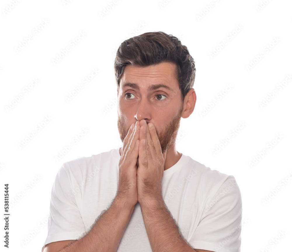 Embarrassed man covering face with hands on white background Embarrassed man covering face with hands on white background