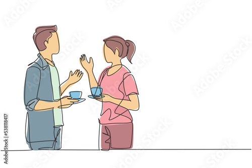 Single continuous line drawing of young male and female workers talking together while office break time. Drinking coffee or tea at workplace concept. One line graphic draw vector design illustration