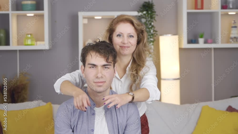 Mother hugging her son in slow motion.
Mother and son looking at camera while hugging from back to son sitting on sofa at home.
Mother hugging her son in slow motion.
Mother and son looking at camera while hugging from back to son sitting on sofa at home.