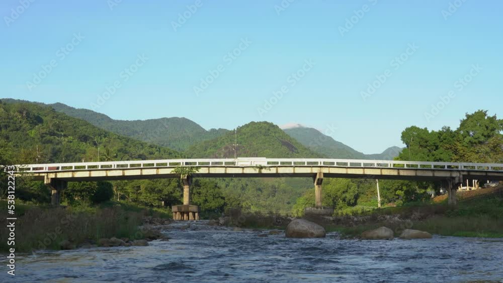 bridge over river in the forest. Morning sun travel holiday vacation. bridge over river in the forest. Morning sun travel holiday vacation.