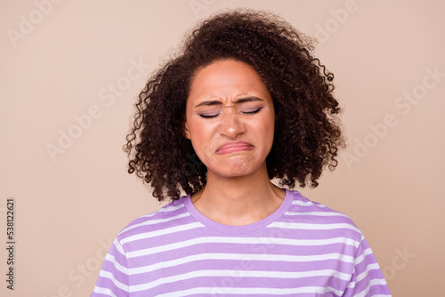 Closeup photo of young attractive nice woman cry unhappy grimace bad day no salary pouted lips isolated on beige color background
