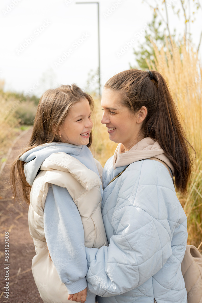 Mother holding little daughter Mother holding little daughter