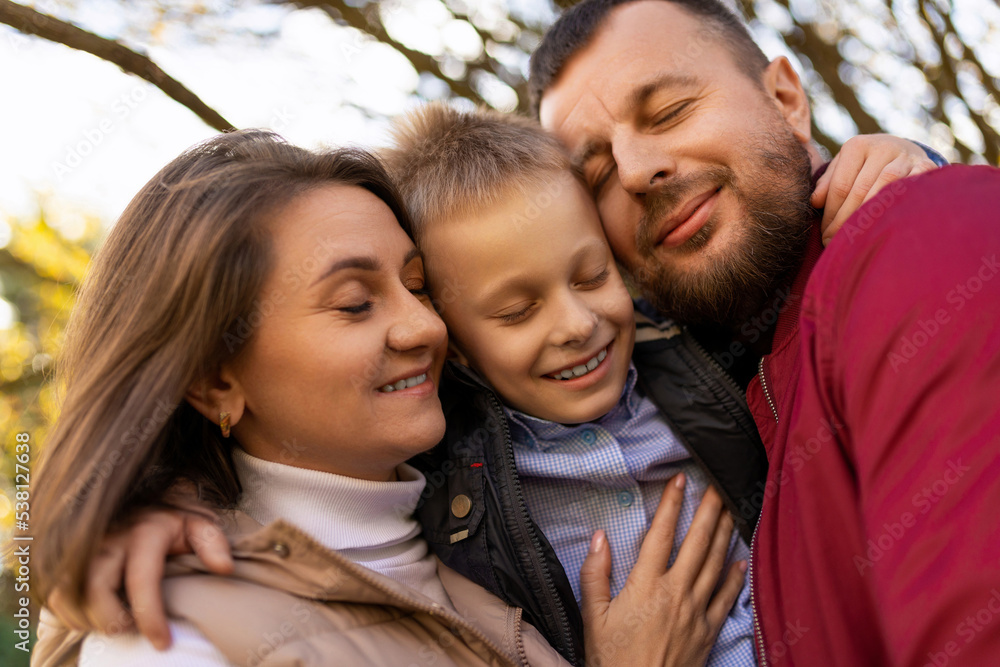 Fototapeta premium photographs of a happy traditional family close-up portrait of mom dad and baby boy