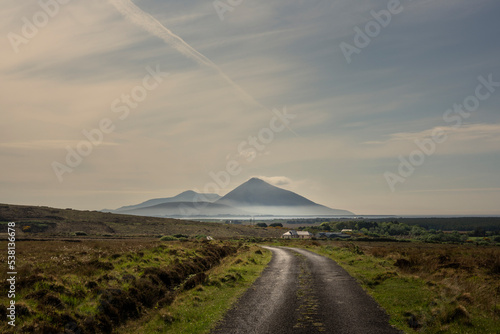 View on Slievemore on Achill Island, from the area of Ballycroy, county Mayo, Ireland.The foot of Slievemore is shrouded in mist.