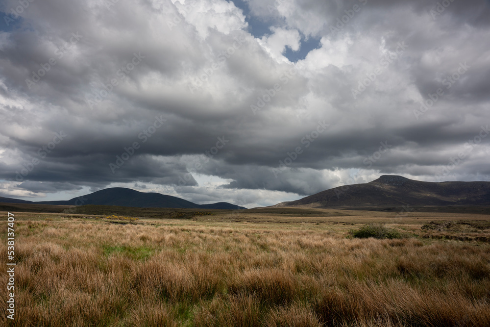 Impressive landscape of the vast and remote peatlands at the edge of Wild Nephin National Park, co. Mayo, Ireland. Impressive landscape of the vast and remote peatlands at the edge of Wild Nephin National Park, co. Mayo, Ireland.