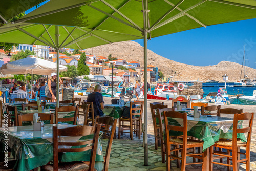 Greek taverna with view on  sea in small picturesque island Halki (Chalki) in Greece
