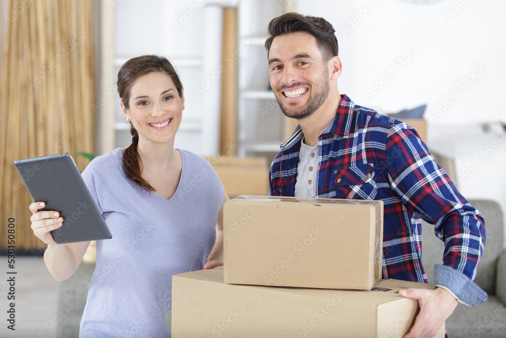 young family moving into a new apartment young family moving into a new apartment