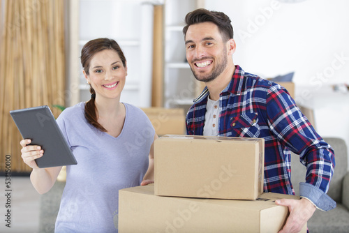 young family moving into a new apartment