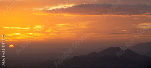 Warm sunset over the mountains in Granada (Spain)