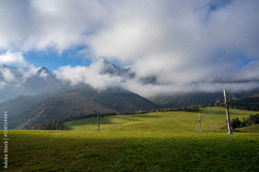 Peaks of Belianske Tatras under the clouds. Strednica, Zdiar, Slovakia. Peaks of Belianske Tatras under the clouds. Strednica, Zdiar, Slovakia.